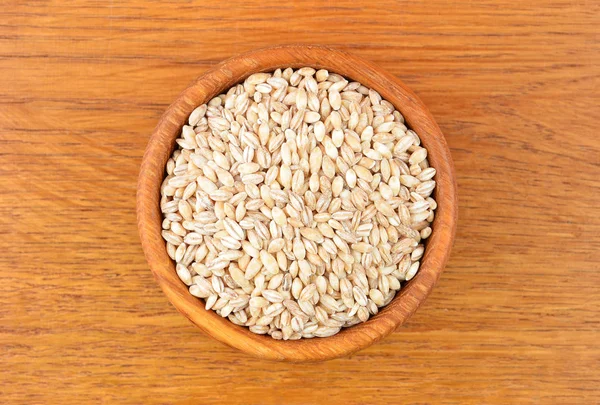 Barley grits in bowl — Stock Photo, Image