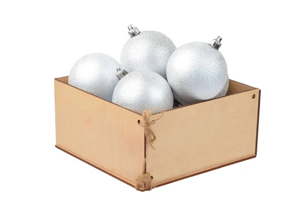 Wooden box with christmas baubles — Stock Photo, Image