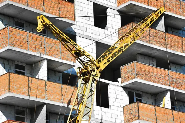 Crane and highrise construction site — Stock Photo, Image