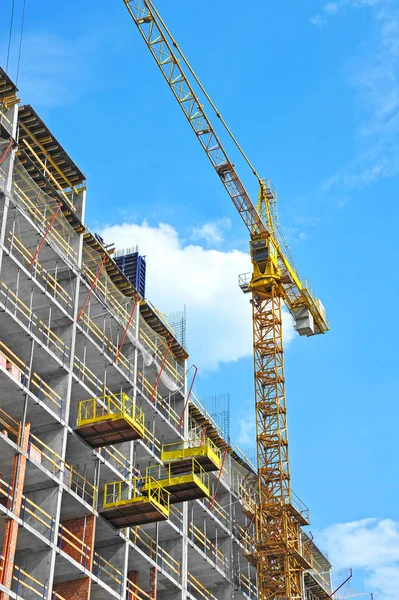 Crane and highrise construction site Stock Image