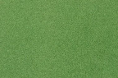 Yeşil synthetical keçe dokulu arka planını yakın çekim