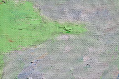 Yeşil ve gri sanat arka planını renklendirin. Tuval üzerine yağlıboya. Kaba ve boya darbeleri hızlı.