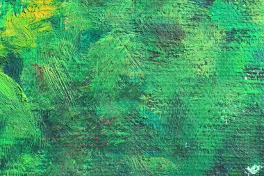 Yeşil renkli yağlı boya keten üzerinde. Soyut sanat arka plan. Kaba yünlü kumaş dokusu. Boya darbeleri.