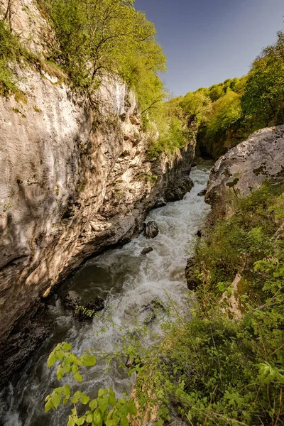 River in gorge flowing with foam — Stock Image River in gorge flowing with foam Stock Photo