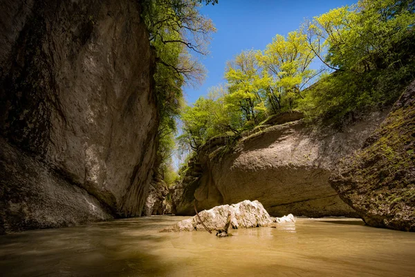 Rock in mountains lake — Stock Image Rock in mountains lake Royalty Free Stock Photos