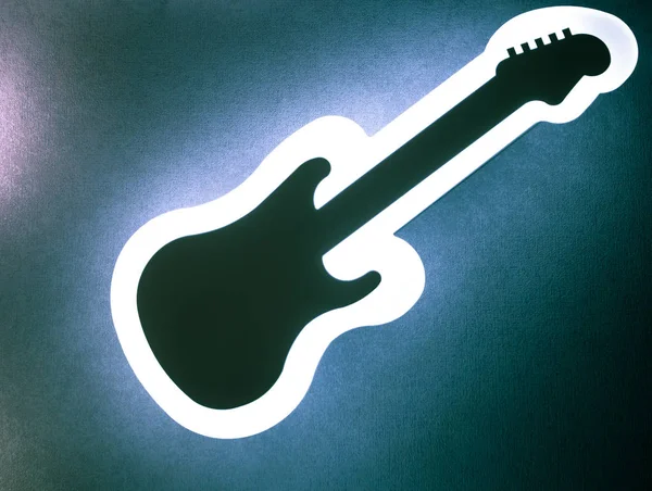 Guitarra de la lámpara en la pared — Foto de Stock