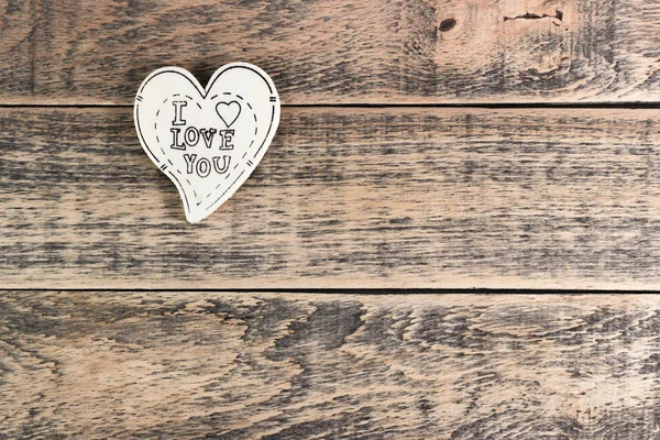 Wooden heart on  texture — Stock Photo, Image