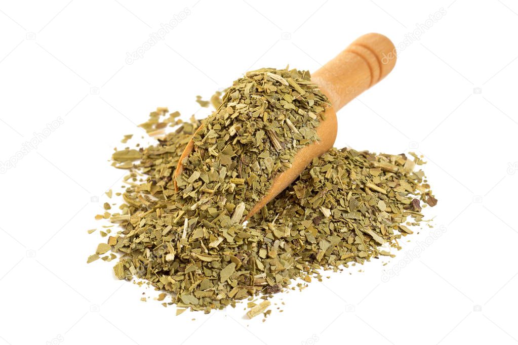 Yerba mate with a wooden spoon on isolate a white background
