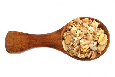 Beyaz arka plan üzerinde kaşık müsli.