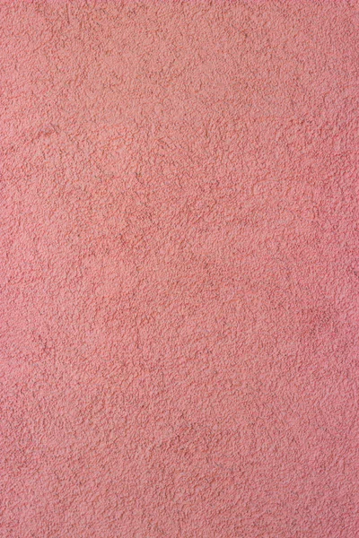 Lo sfondo di un muro di cemento dipinto in rosa — Foto Stock