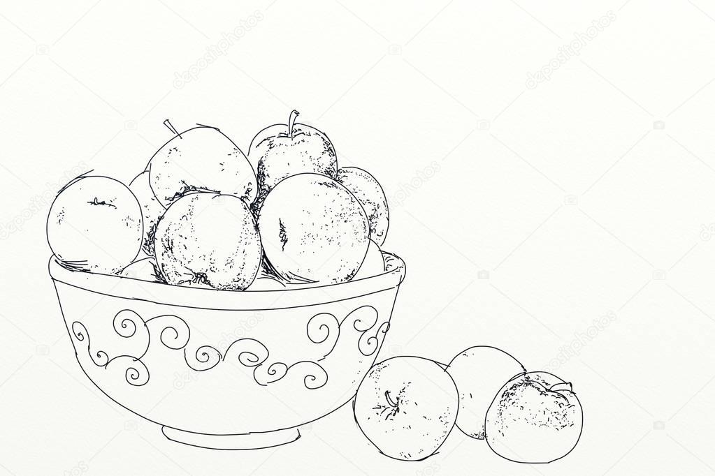 apples in a fruit bowl