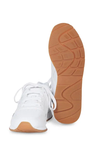 Vita kvinnliga sneakers isolerad på vit — Stockfoto