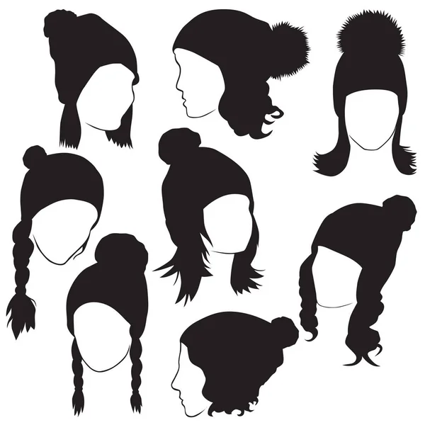 Female heads in winter hats — Stock Vector