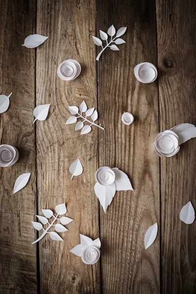 Paper flowers on the wood background — Stock Photo, Image