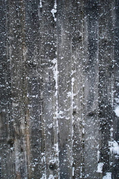 Copos de nieve en las tablas —  Fotos de Stock