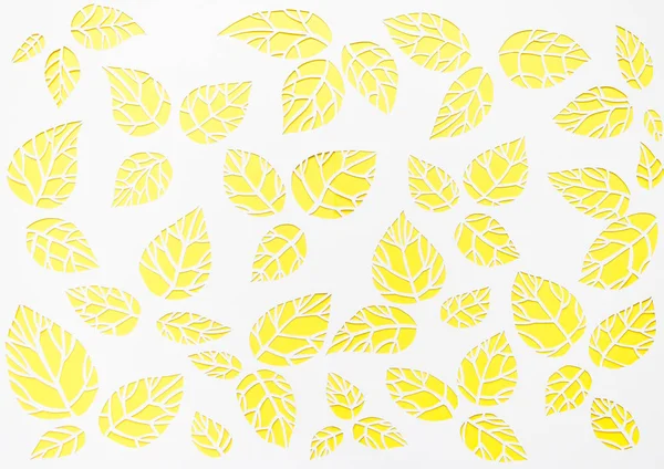 White, yellow background leaves. leaves cut from paper — Stock Photo, Image