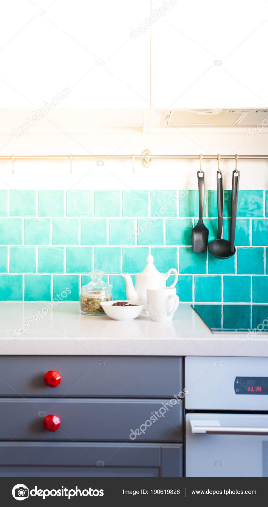 Kitchen Features Dark Gray Flat Front Cabinets Paired With White