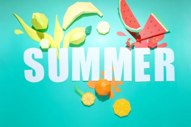 Different exotic fruits made of paper on trendy mint background