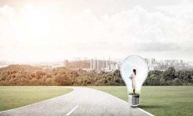 usinesswoman ampul içinde sıkışmış