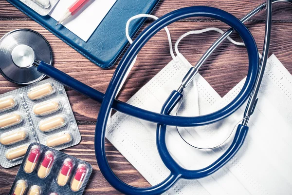 Desk of doctor with medicine things