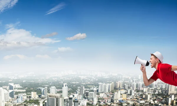 Guy screaming in loudspeaker — Stock Photo, Image