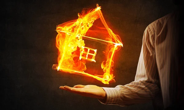 Casa icono de fuego en la palma —  Fotos de Stock