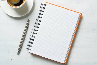 Coffee with notepad and pen clipart