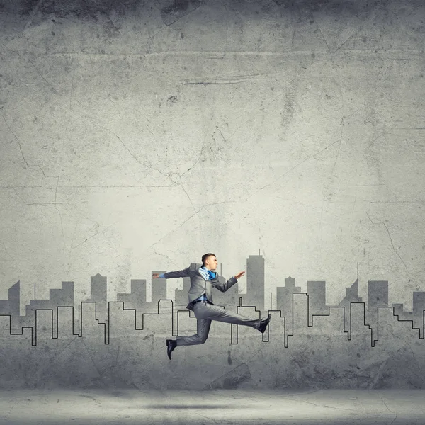 Businessman jumping high — Stock Photo, Image