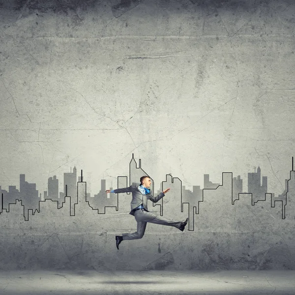 Businessman jumping high — Stock Photo, Image