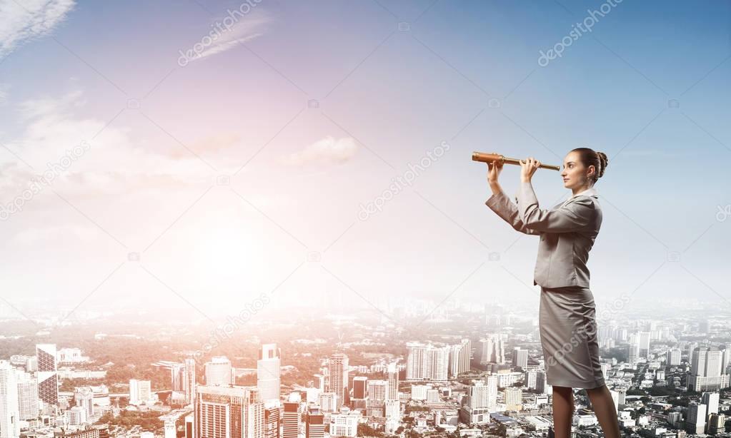 Career woman on building roof