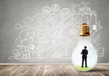 Ampulde sıkışan bir iş adamı