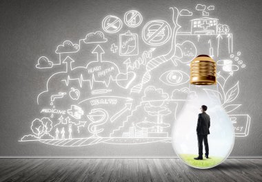 Ampulde sıkışan bir iş adamı