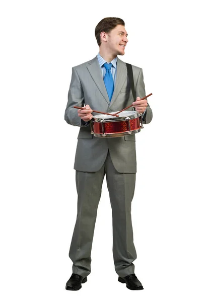 Businessman playing drums — Stock Photo, Image