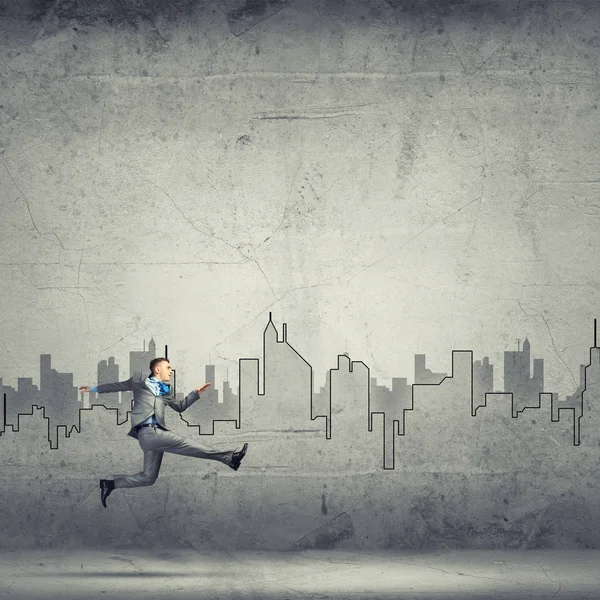 Businessman jumping high — Stock Photo, Image