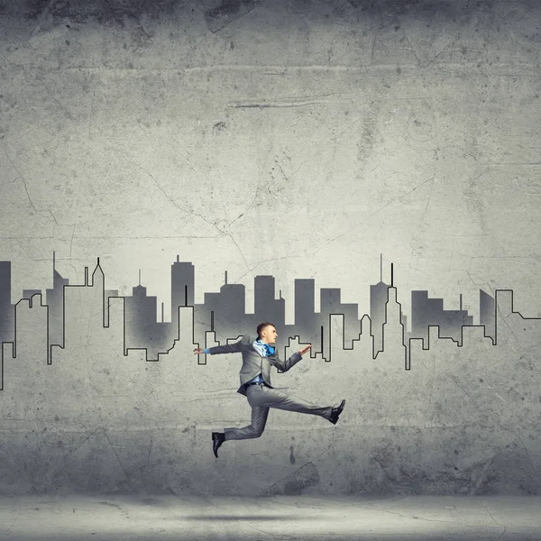 Businessman jumping high — Stock Photo, Image