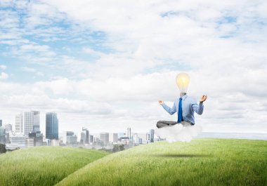 Lotus poz oturan işadamı