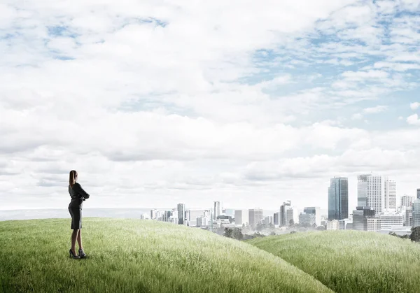 Businesswoman standing with back — Stock Photo, Image