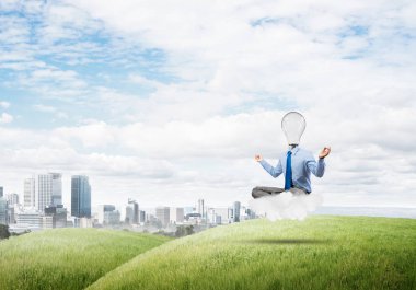 Lotus poz oturan işadamı