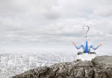 Lotus poz oturan işadamı