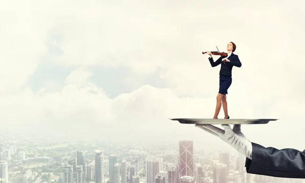 Business woman standing on tray — стоковое фото