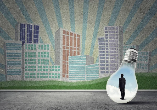 Businessman trapped in bulb — Stock Photo, Image