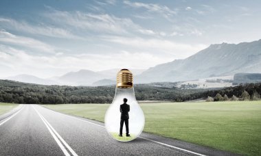 işadamı ampul içinde sıkışmış