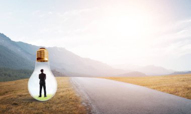 işadamı ampul içinde sıkışmış