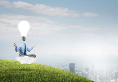 Lotus poz oturan işadamı