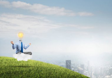 Lotus poz oturan işadamı