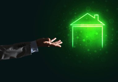 Evinde gösteren bir el ile kavramsal görüntü 