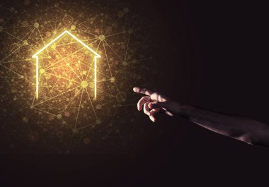 Evinde gösteren bir el ile kavramsal görüntü  