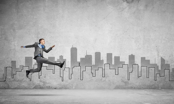 Businessman jumping high — Stock Photo, Image