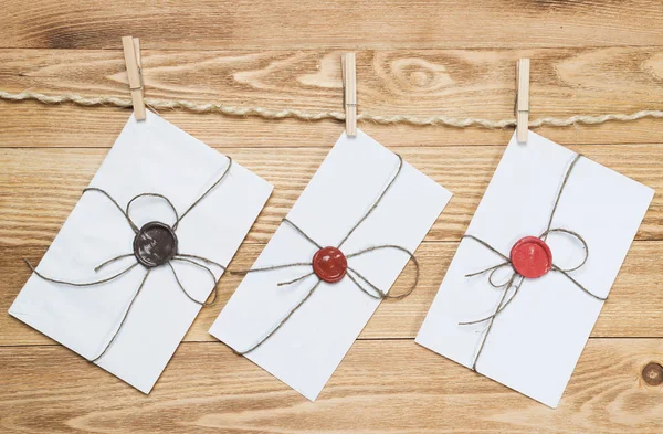 Envelopes hanging on rope — Stock Photo, Image