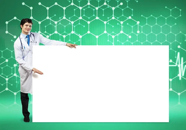 Doctor with white blank banner — Stock Photo, Image